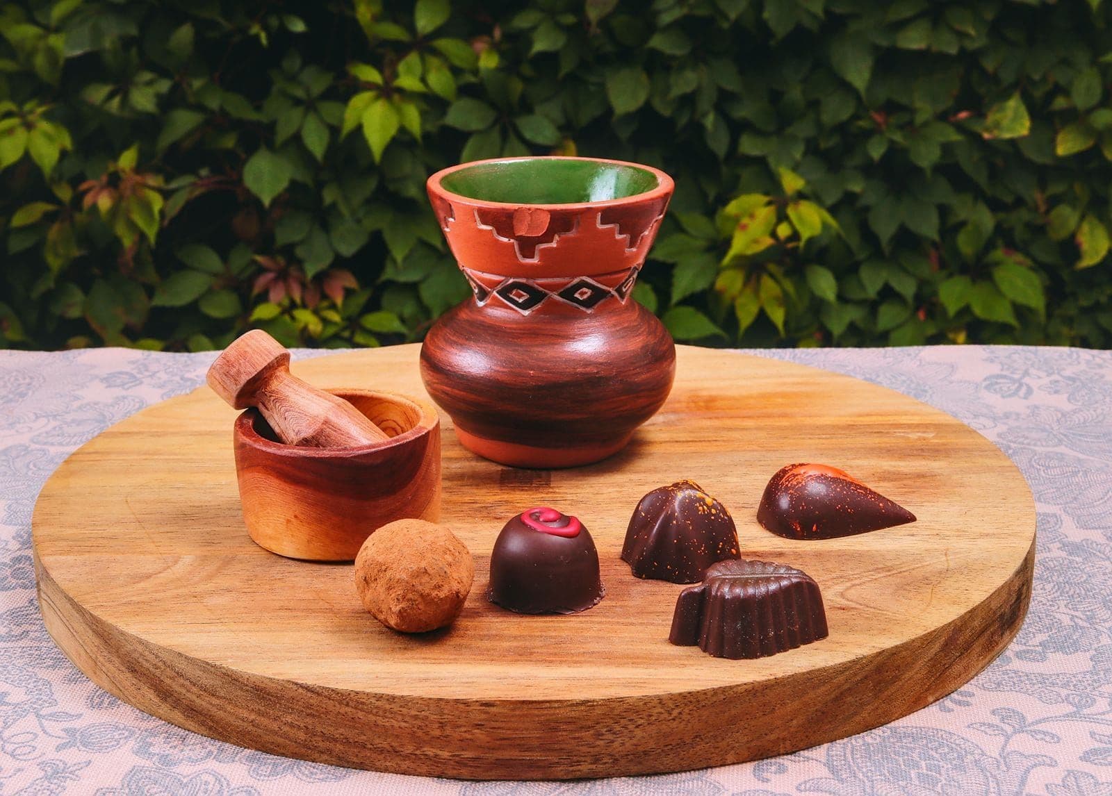 A small board of hand-finished chocolates in different shapes